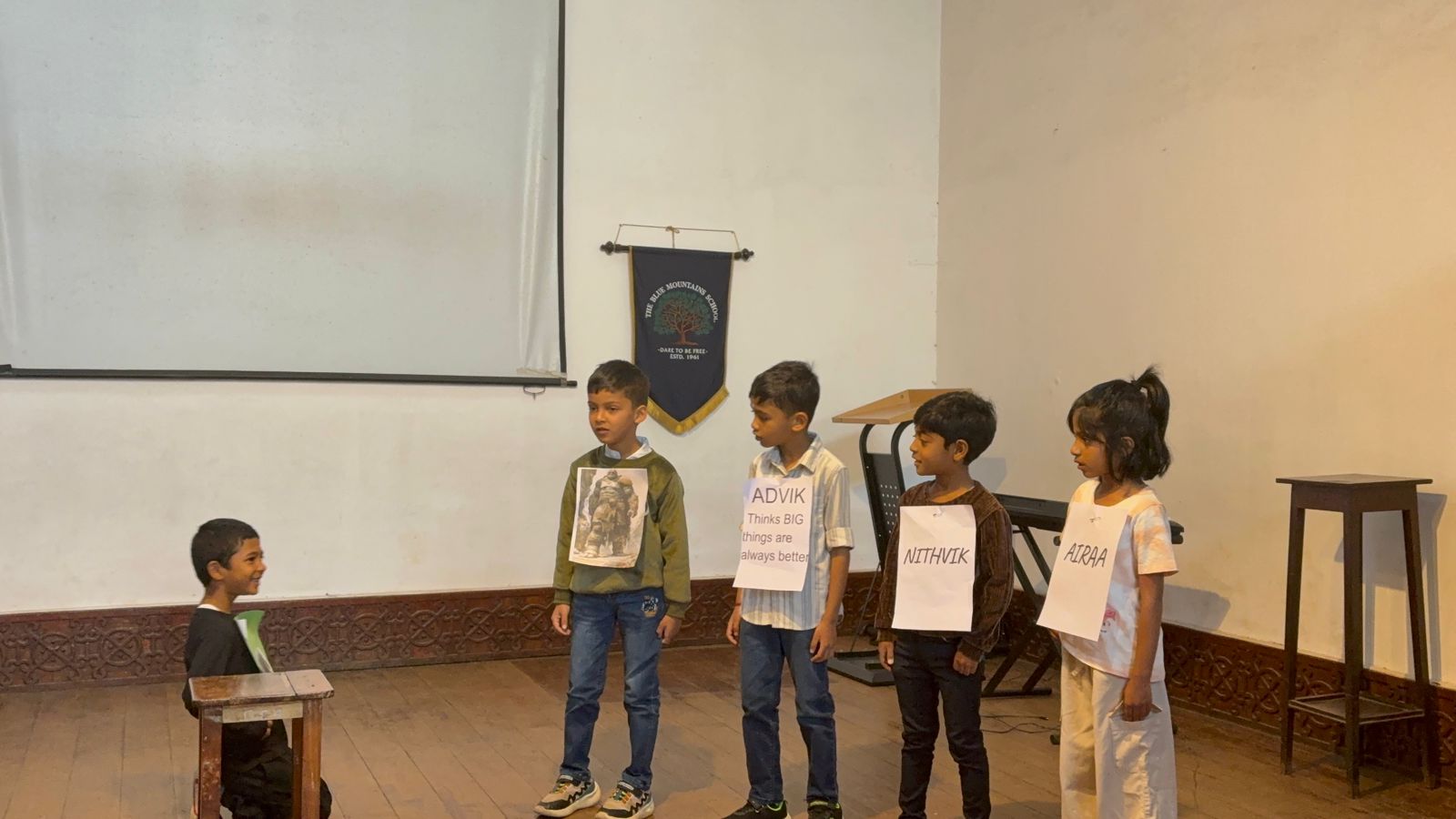 The narrator continues the story as Advik, Nithvik and Airaa look on