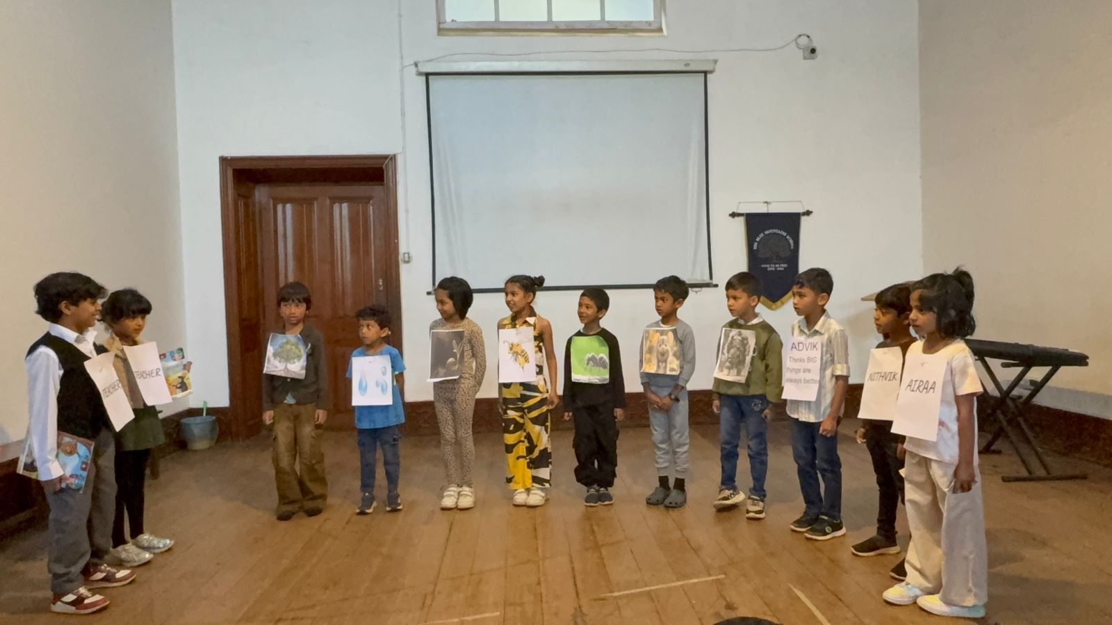 The full cast lines up on stage as the story continues