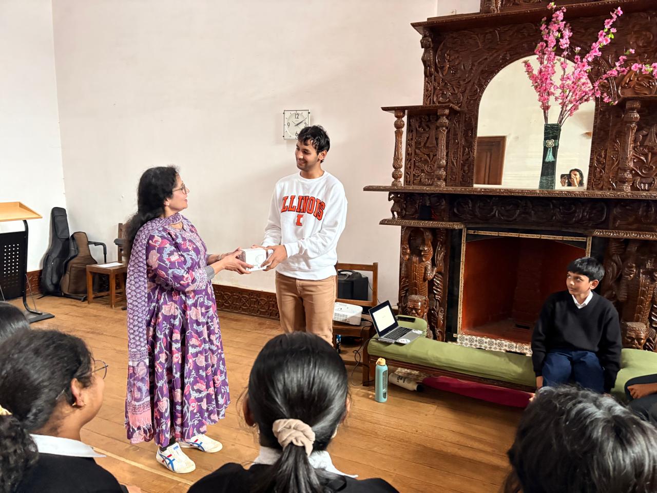 BMS presenting a thank-you gift to speaker Shansha Syed Ibrahim