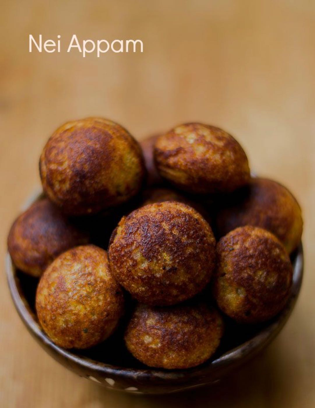 A bowl of finished nei appam