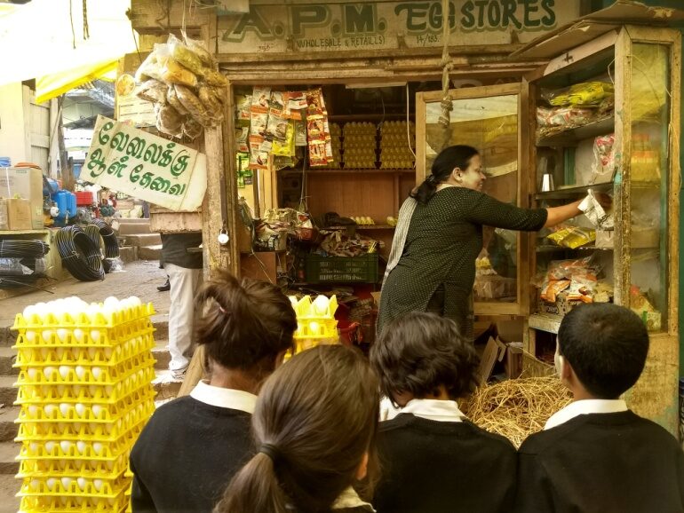 Flower stall with garlands