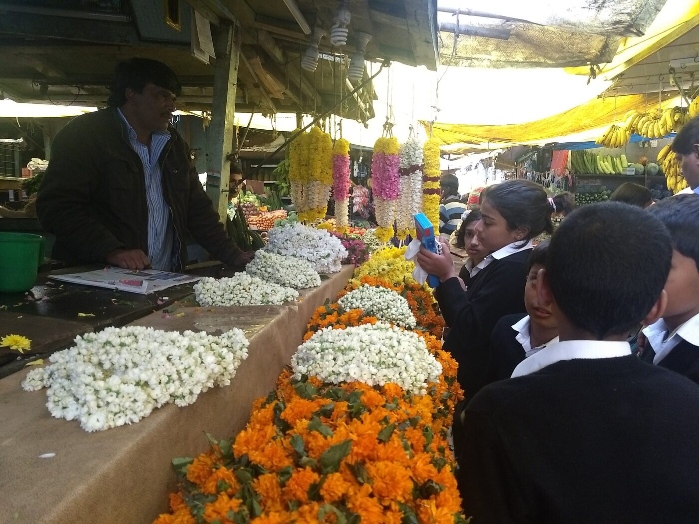 Close-up of marigold and jasmine garlands